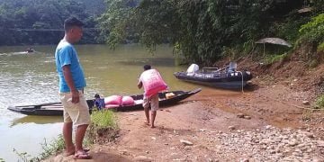 Bad road forced group to ferry aid items by boat