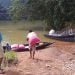 Bad road forced group to ferry aid items by boat