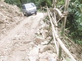 Villagers forced to clear mud after landslide