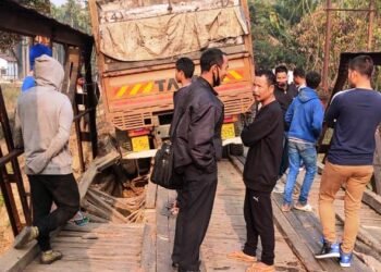 Wooden bridge damaged by overloaded coal truck