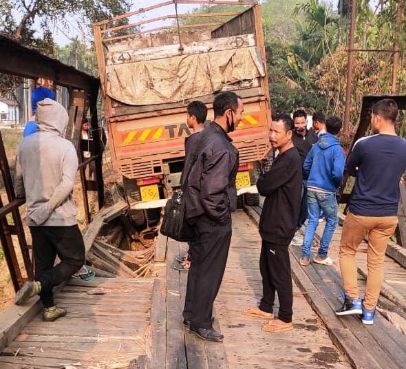 Wooden bridge damaged by overloaded coal truck