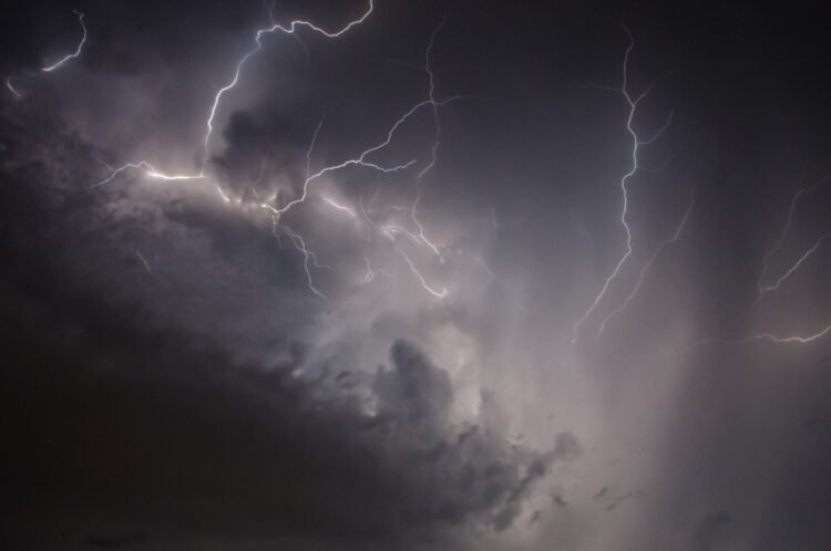 Lightning strike kills 2, injures 13