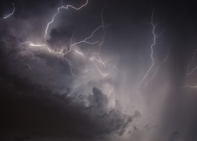 Lightning strike kills 2, injures 13