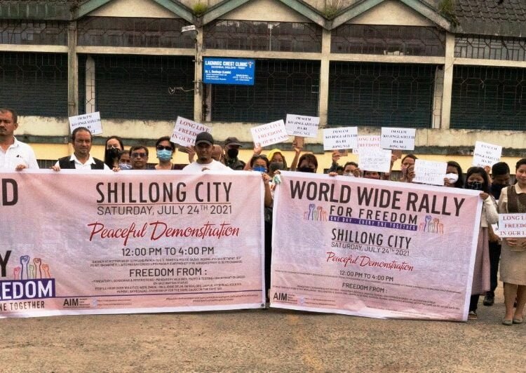 AIM’s plan to march fails, protest placard raised