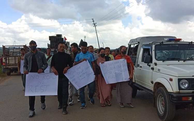 Upset over bad road, villagers stage black-flag march