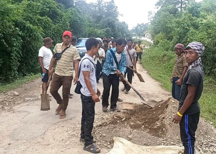 Tired of waiting for Govt, Ri-Bhoi locals repair vital road