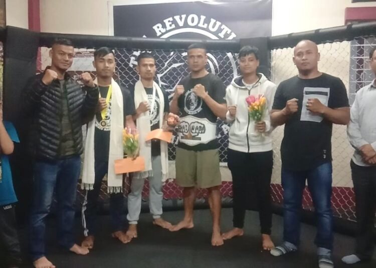 Cage fight medallists felicitated