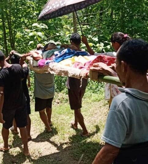 Villagers carry sick woman on stretcher due to lack of proper road