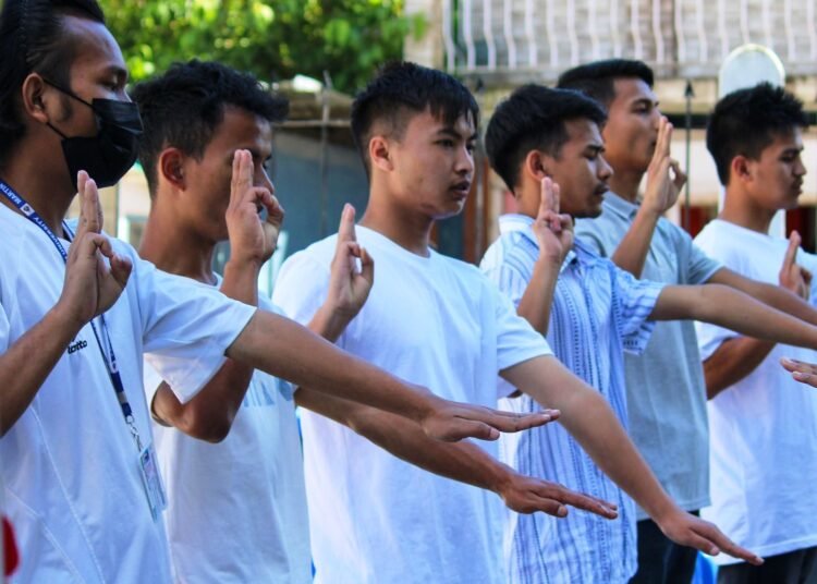 35 MLCU students inducted as rovers and rangers