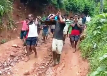 Injured man carried to hospital as awful road keeps out vehicles