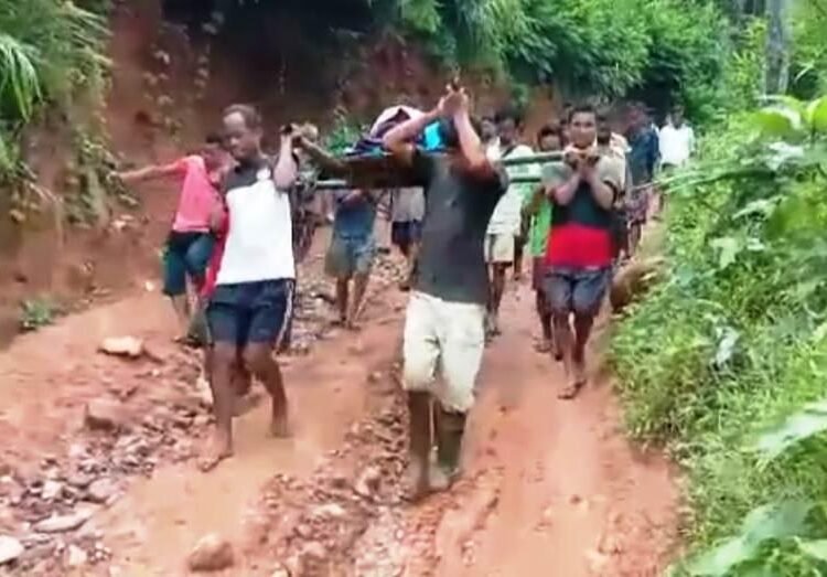 Injured man carried to hospital as awful road keeps out vehicles