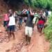 Injured man carried to hospital as awful road keeps out vehicles