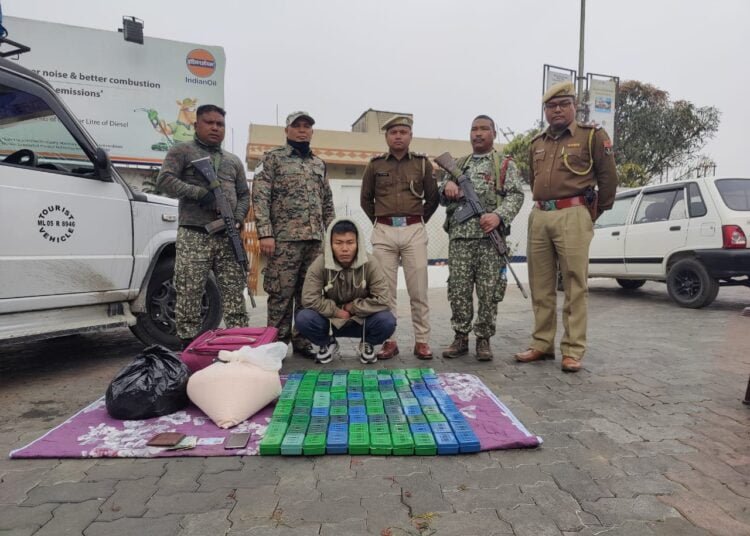 Man arrested with over 1 kg heroin