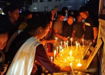 Attendees demand justice for Walinda at candlelight vigil