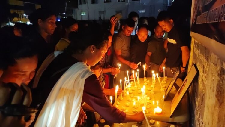 Attendees demand justice for Walinda at candlelight vigil