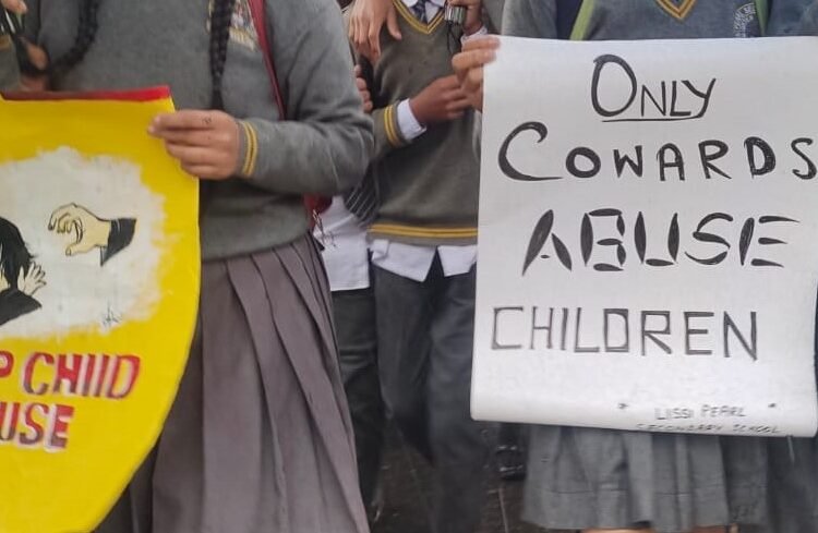 School students hold rally in support of rape survivor