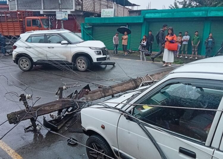 2 vehicles damaged in electricity pole collapse, none hurt