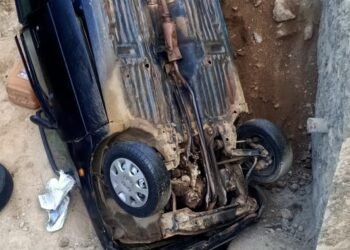 1 dies as car plunges into a drain