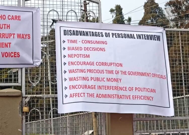 KHNAM holds sit-in protest to abolish personal interviews