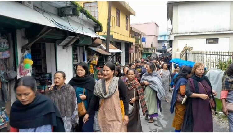 Consumers march to MePDCL office
