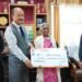 DC hands over cheque worth Rs 2.20 lakh to runner Kmoin