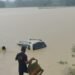 SDRF recovers car swept away by flood water, father-son feared dead