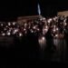 Candlelight vigil held for youth killed by police escort