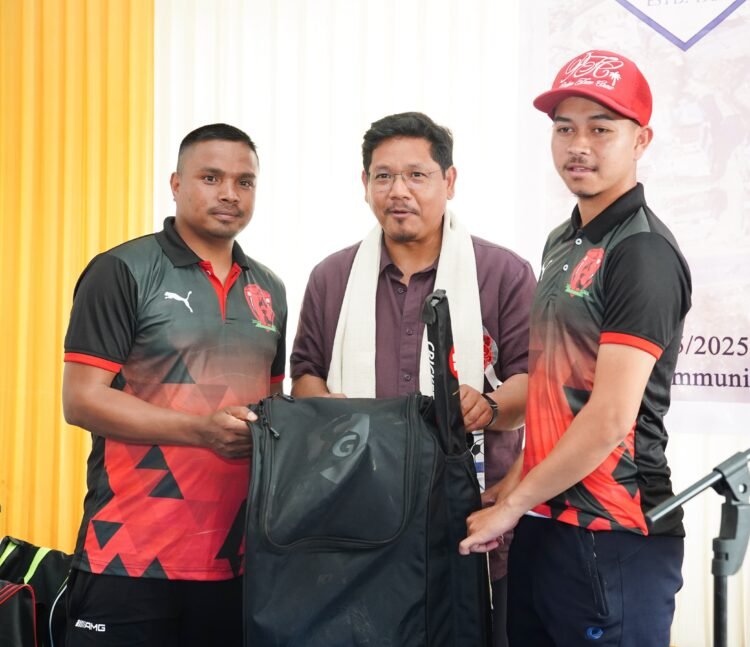 After impromptu cricket game CM hands kit to local clubs