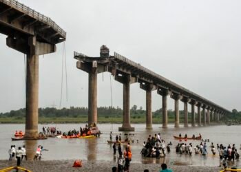 11 killed as vehicles fall into river after part of bridge collapses in Vadodara