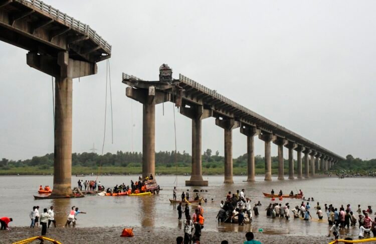 11 killed as vehicles fall into river after part of bridge collapses in Vadodara