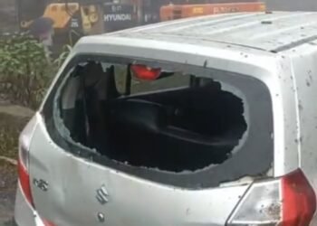 Narrow escape for passengers as boulder crashes into car