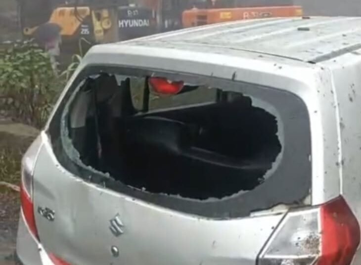 Narrow escape for passengers as boulder crashes into car
