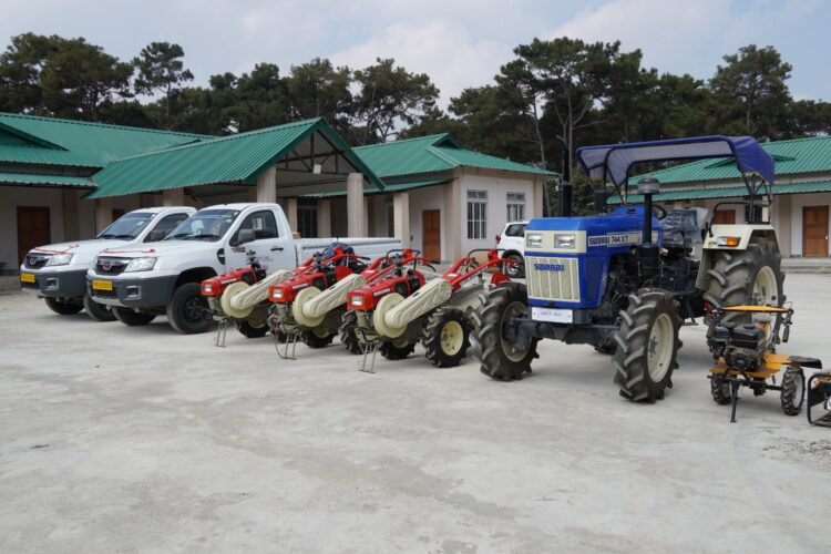 Farmers receive agricultural implements
