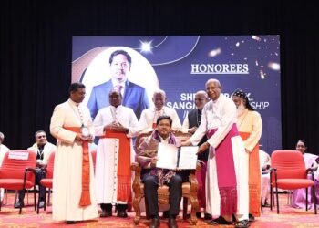 Conrad gets award from Catholic Bishops