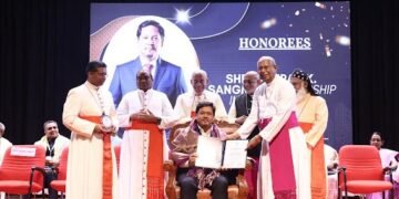 Conrad gets award from Catholic Bishops