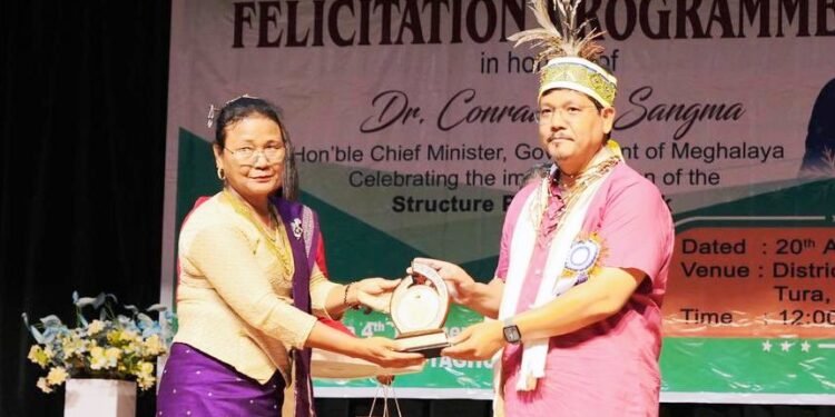 Conrad honoured for education reforms