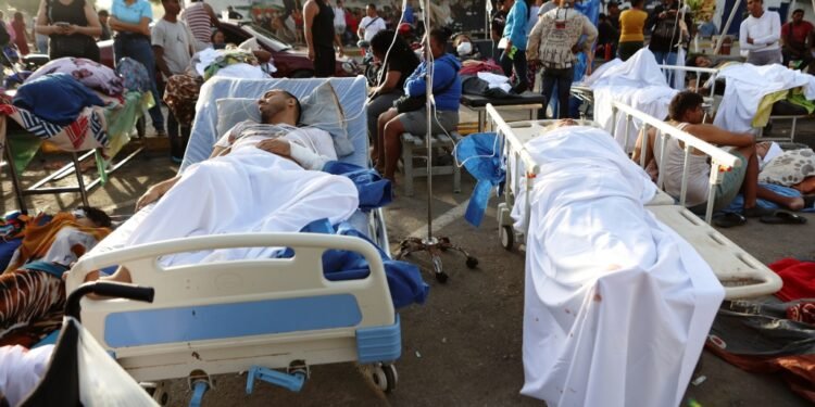 At least 164 dead, 971 injured after powerful quakes rock Venezuela, acting president says