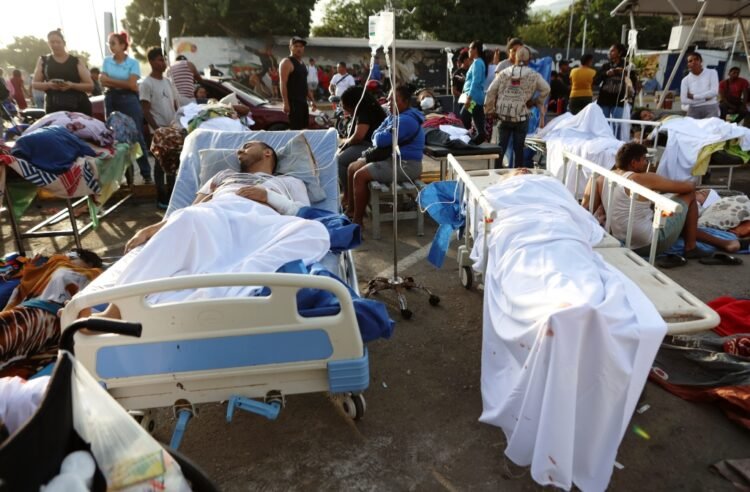 At least 164 dead, 971 injured after powerful quakes rock Venezuela, acting president says