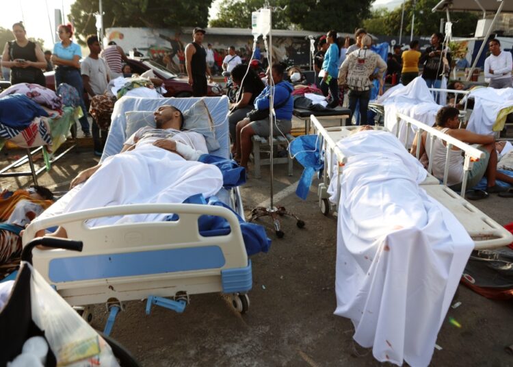 At least 164 dead, 971 injured after powerful quakes rock Venezuela, acting president says