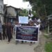 Village rallies to condemn murder