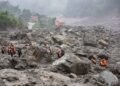 Nepal digs through mud and grief, as families search for loved ones