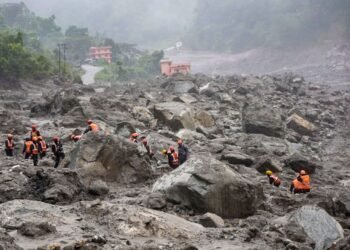 Nepal digs through mud and grief, as families search for loved ones