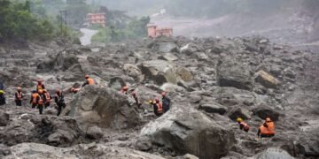 Nepal digs through mud and grief, as families search for loved ones