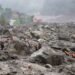 Nepal digs through mud and grief, as families search for loved ones